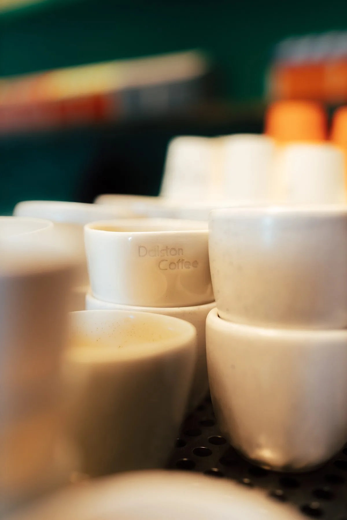 Branded coffee cups at a specialty coffee shop