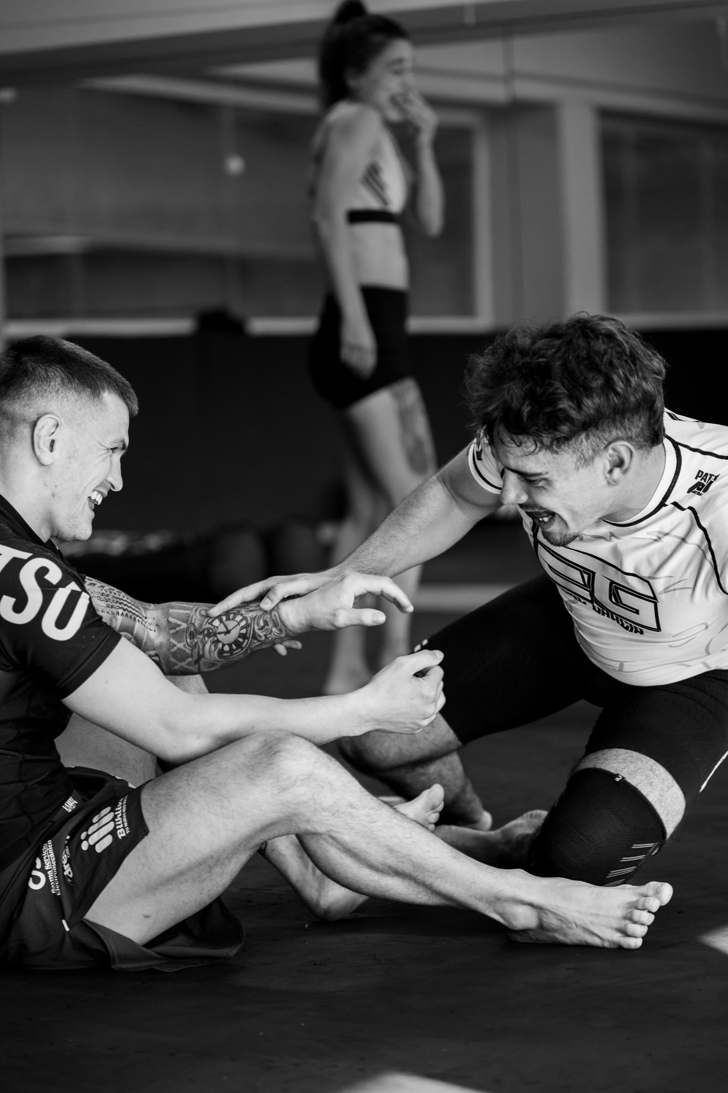 Grappling session with athletes on the mat